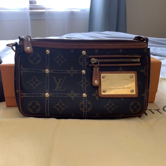 Monogram Riveting Pochette Accessories - Picture 1 of 15